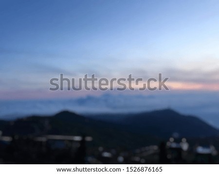 Blur or Defocus image of​ sky cloud or​ sun for use as Background  