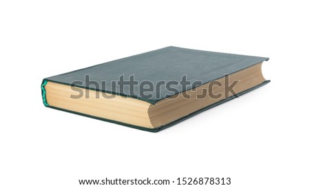 Closed color hardcover book on white background