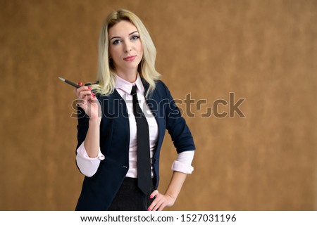 Studio portrait of a pretty blonde student girl with long hair in a jacket on a beige background. Smiling at camera with emotions in various poses.