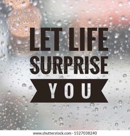 Inspirational motivating quote on blur background, "Let life surprise you"