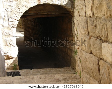 Narrow cobbled ancient streets in traditional town Deir el Qamar, Lebanon