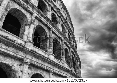 View in black and white of the Coliseum, the great beauty of Rome. The largest amphitheater used for gladiator competitions and public performances. Royalty-Free Stock Photo #1527072317