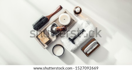 Man spa accessories to shaving and grooming lying on a clean white background, flat lay, top view Royalty-Free Stock Photo #1527092669