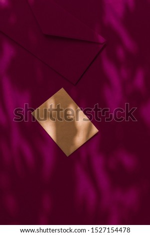 Holiday marketing, business kit and email newsletter concept - Beauty brand identity as flatlay mockup design, business card and letter for online luxury branding on maroon shadow background