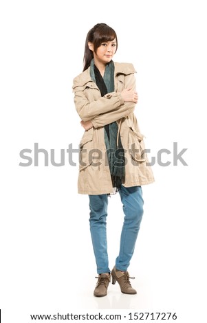 Asian young woman dress autumn coat and scarf , full length portrait isolated on white background.