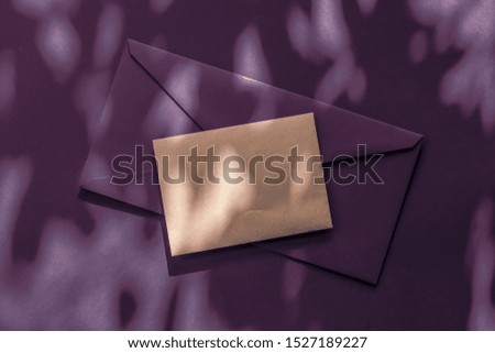 Holiday marketing, business kit and email newsletter concept - Beauty brand identity as flatlay mockup design, business card and letter for online luxury branding on plum shadow background