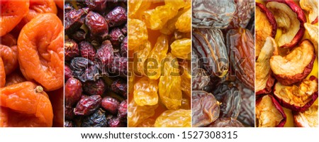 Collage set of organic sun dried fruits dehydrated apricots yellow golden raisins dates rose hips apples on long banner. Healthy diet wholefoods vegan superfoods concept. Creative food poster Royalty-Free Stock Photo #1527308315