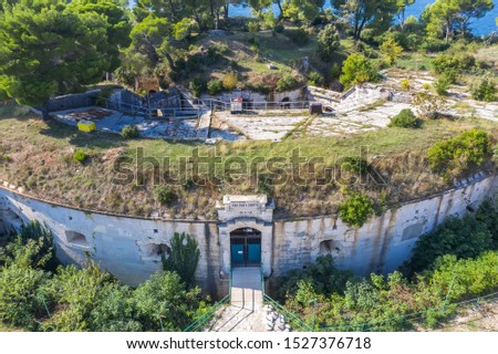 An aerial view of Fort Punta Christo, Štinjan, Istria, Croatia, against Brijuni islands; Translation: Fort name - Fort Punta Christo, built at the end of 19th century by the Austro-Hungarian Monarchy