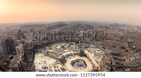 The holy mosque and Makkah city view from the top of Makkah clock tower during sunset. Hajj and event in Makkah Royalty-Free Stock Photo #1527395954