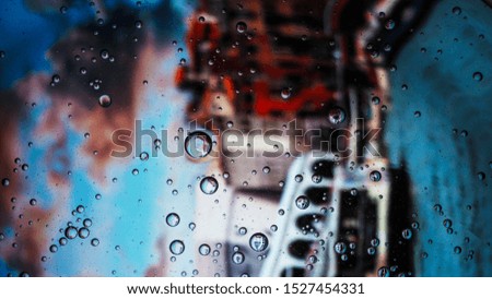 Oil drop on water surface. Mixing water and oil, beautiful color abstract background based on colorful circles and ovals, macro abstraction.