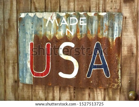 Handmade made in USA sign on galvanized steel. Closeup.