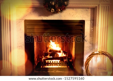 Composite image of brown parquet against fireplace at christmas time