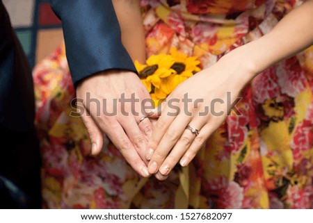 Wedding ring pictures.Picture of couple feeling happy.