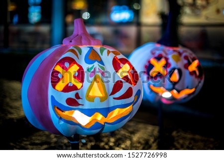 Fancy pumpkin doll with light, popular for decorating during the Halloween season.