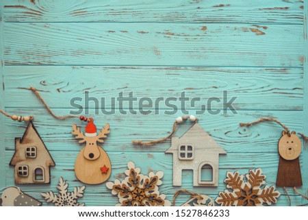Christmas decoration on wood turquoise background. New Year concept. Copy space. Flat lay. Top view.