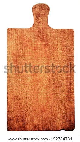 Close-up of worn wooden cutting board, shot from high angle, isolated on white background