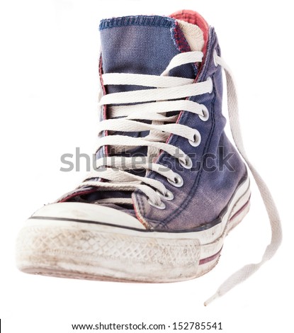 dirty sneakers on a white background