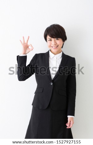 Portrait of a woman in a suit