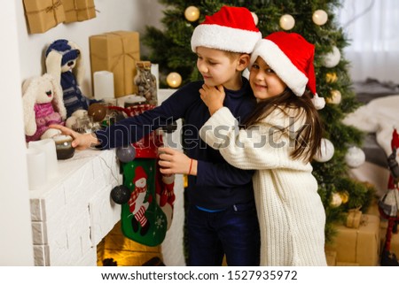 Christmas Kids. Happy Children Opening Gifts. New Year. Christmas Tree