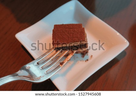 Cake on a white plate, sweets buffet