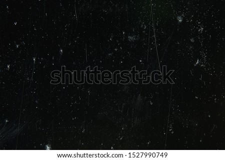 noise black background overlay / abstract film noise, black texture, white scratches Royalty-Free Stock Photo #1527990749