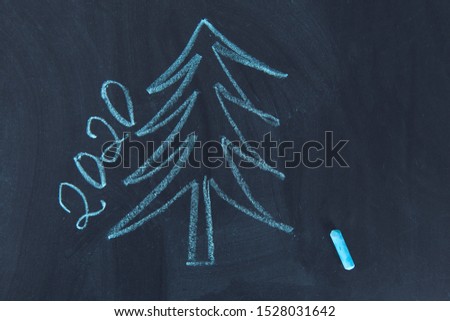 fir  and 2020 text on the chalkboard