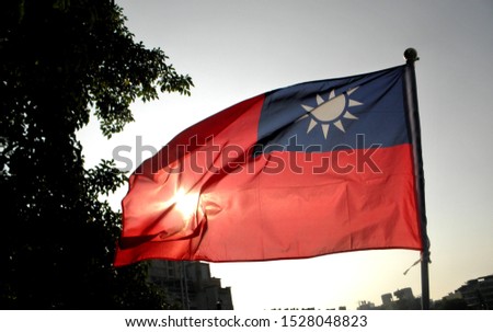 Taiwan or Republic of China flag flying in the sky, backlight photography