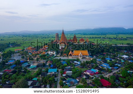 Aerial view of Tiger Cave Temple (Wat Tham Sua) located top of the mountain in Kanchanaburi province, Thailand