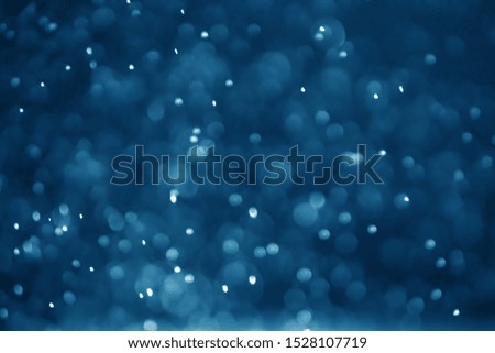 Abstract bokeh on blue background