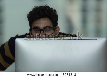 people  using computer ,Young man with computer.