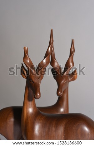 wooden antelopes on a white background.