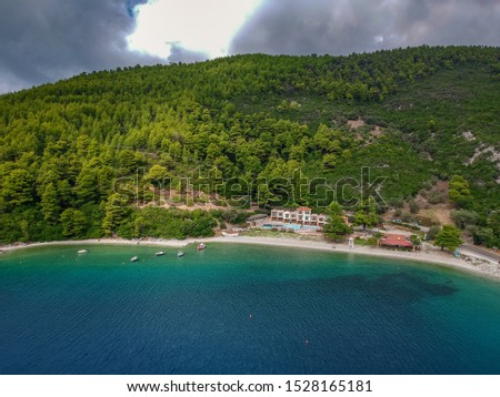 Amazing scenery over Skopelos island Greece in Autumn. Skopelos is the largest island of Sporades complex, covering 96 square km covered at 80% of its total extent from pinewoods, damaskins and olives