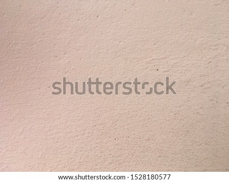 Vintage pink concrete wall background for texture design