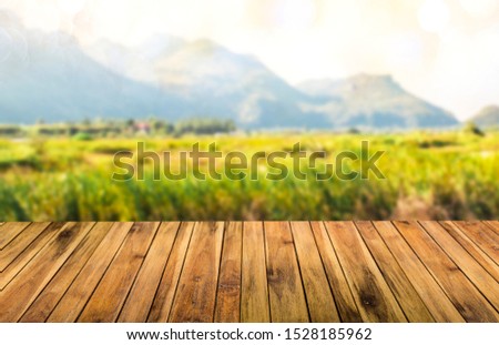 wooden table top with the mountain landscape.