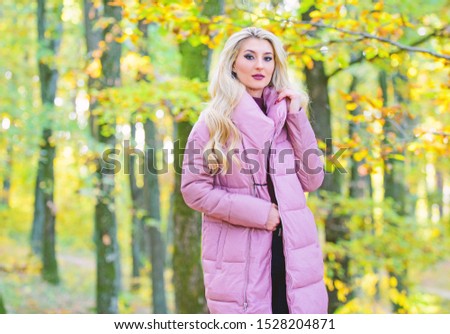 Jackets everyone should have. Girl fashionable blonde walk in park. Best puffer coats to buy. How to rock puffer jacket like star. Puffer fashion concept. Outfit prove puffer coat can look stylish.