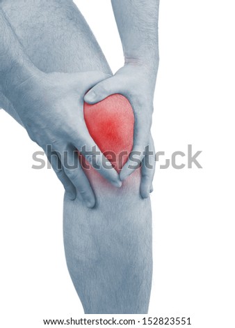 Acute pain in a man  knee. Male holding hand to spot of knee-aches. Concept photo with Color Enhanced blue skin with read spot indicating location of the pain. Isolation on a white background.