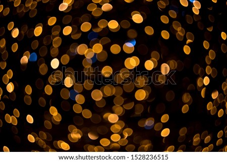 Fabulous bokeh of swirling colored lights. Perfect background for your banner.