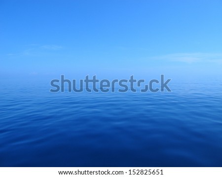 Blue Water Meets Blue Sky Royalty-Free Stock Photo #152825651