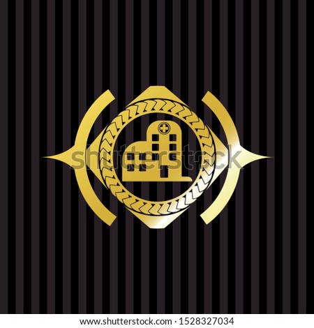 hospital icon inside gold badge or emblem