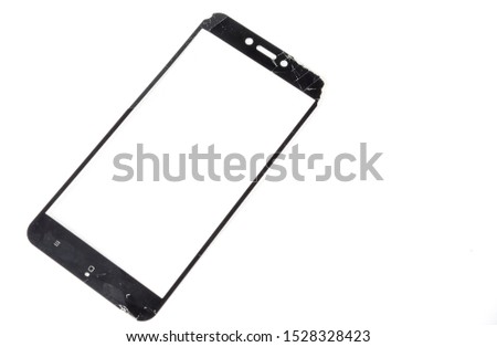 Broken smartphone protection glass on a white background
