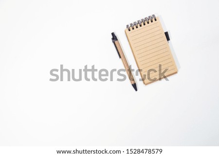 Brown notebook on white background