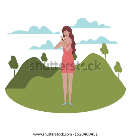 young woman lifting cute dog mascot in the field vector illustration design