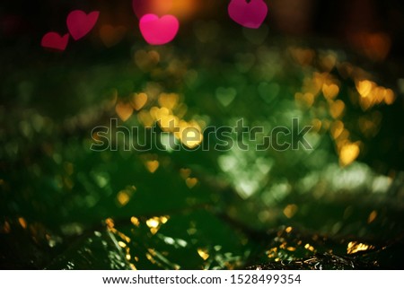 Green paper gift wrap decoration closeup texture blur background. Concept of Holiday Christmas background