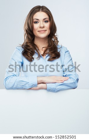 Business woman blank white banner, card isolated studio portrait. Female model poses.