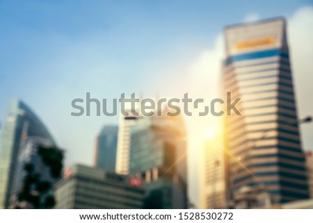 Blur capital town many buildings in city with high technology transportation system  with sunlight background.
