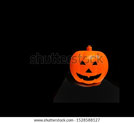 Halloween pumpkin with black background, background texture concept.