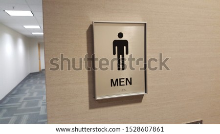 Baige Men's Room Sign with Little Man Illustration and Hallway