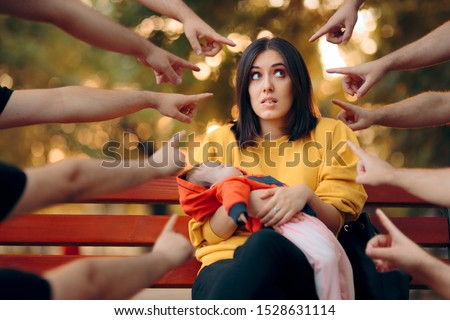 Mommy Shaming Concept Portrait of a Mother and her Baby. Fingers pointed at mom being criticized by society for her choices
 Royalty-Free Stock Photo #1528631114