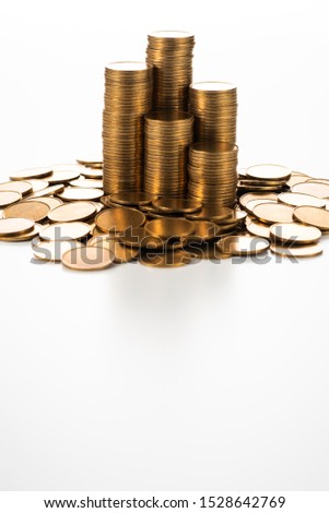 Stacked coins on white background