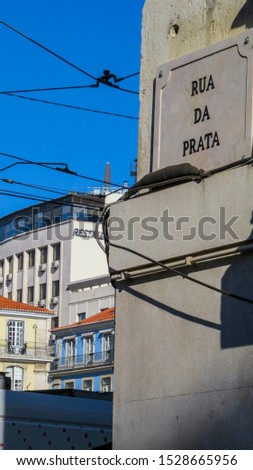 Sign street on the wall of  a building in Lisbon, Portugal